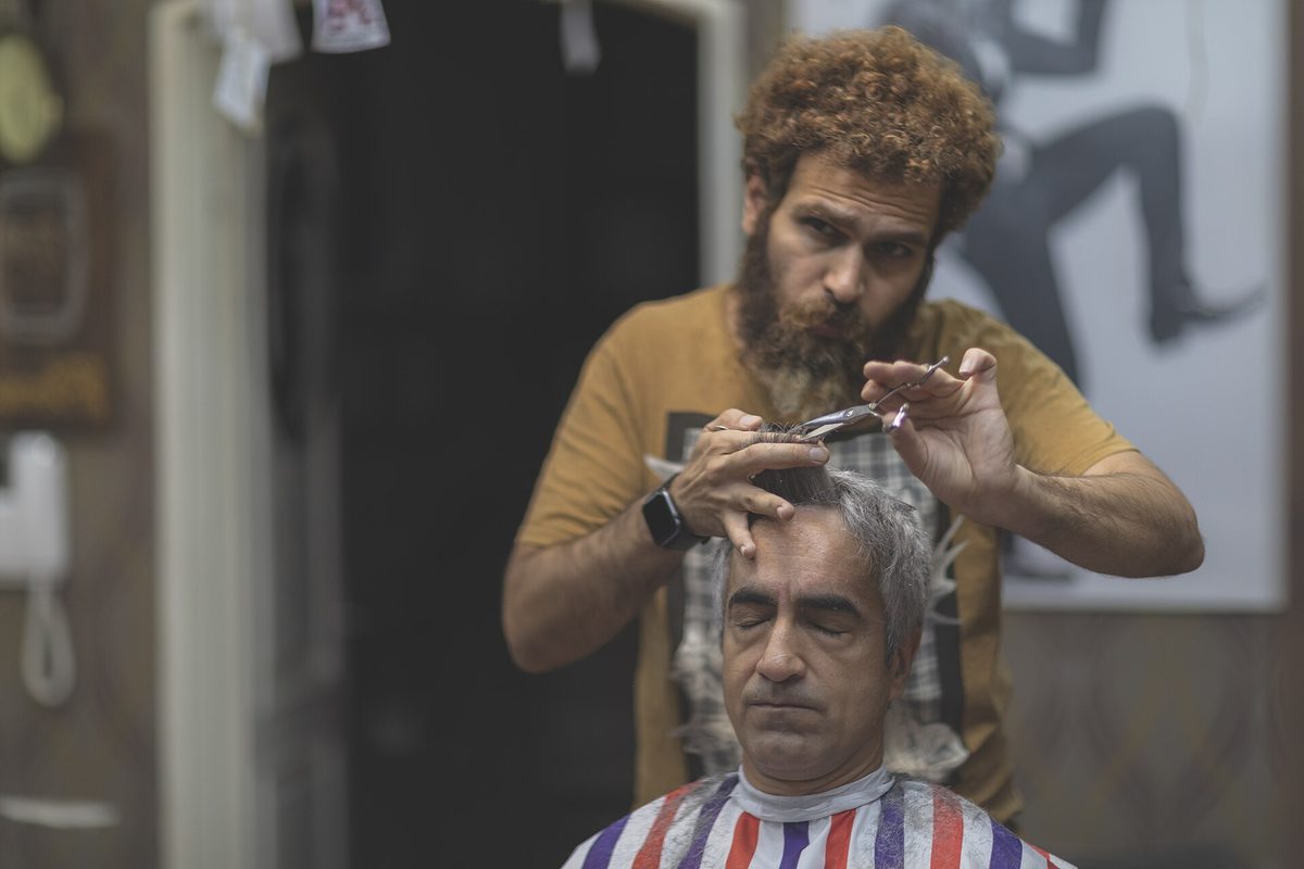 A client at the salon mirror